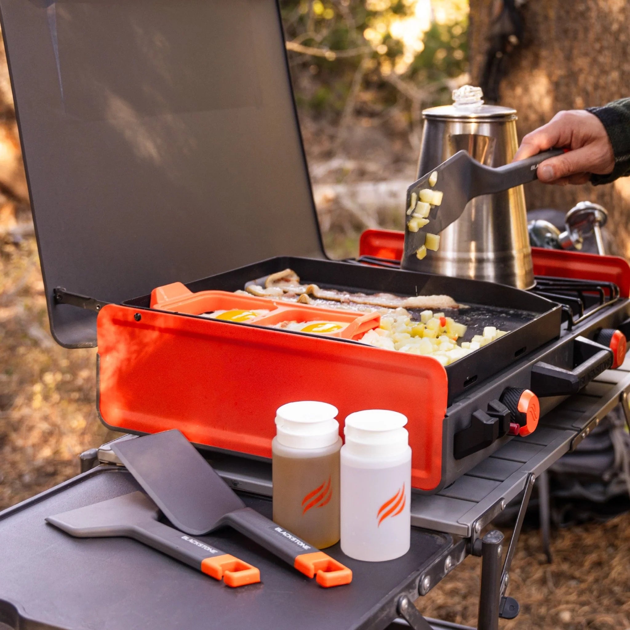 Portable Blackstone griddle tool kit with two spatulas scraper and sauce bottles