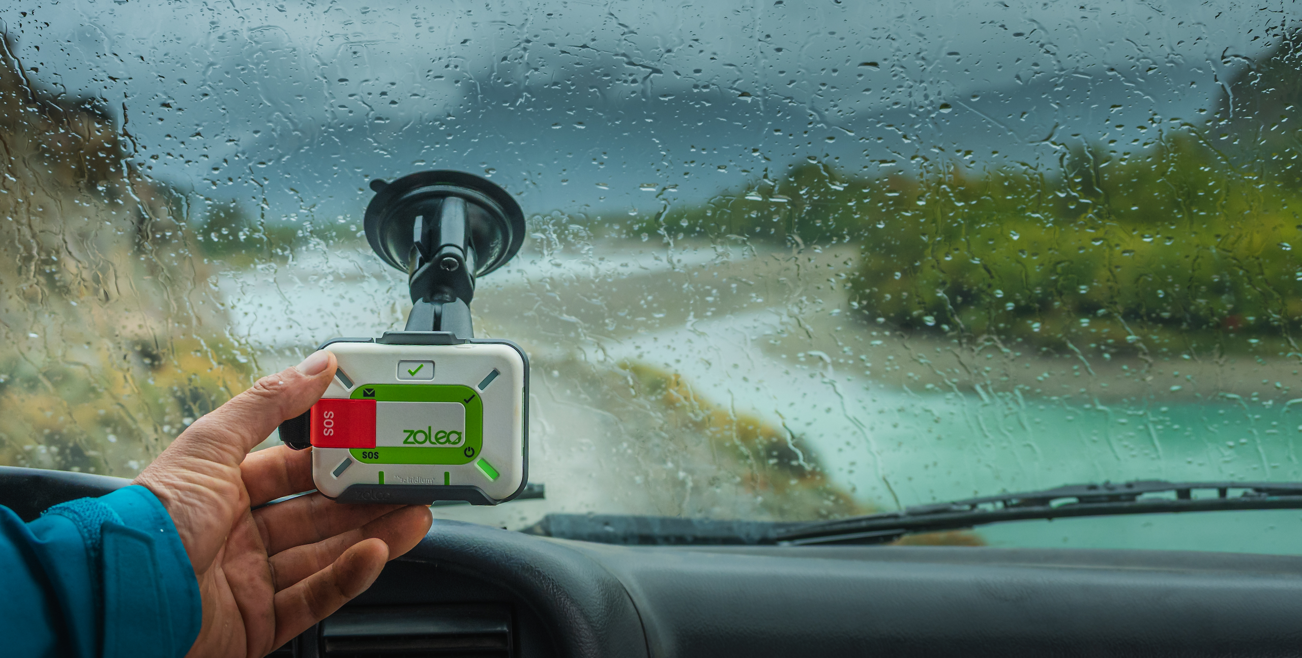 Limestone-colored ZOLEO Satellite Communicator designed for backcountry travel with satellite messaging, GPS location sharing, weather updates, and emergency SOS.
