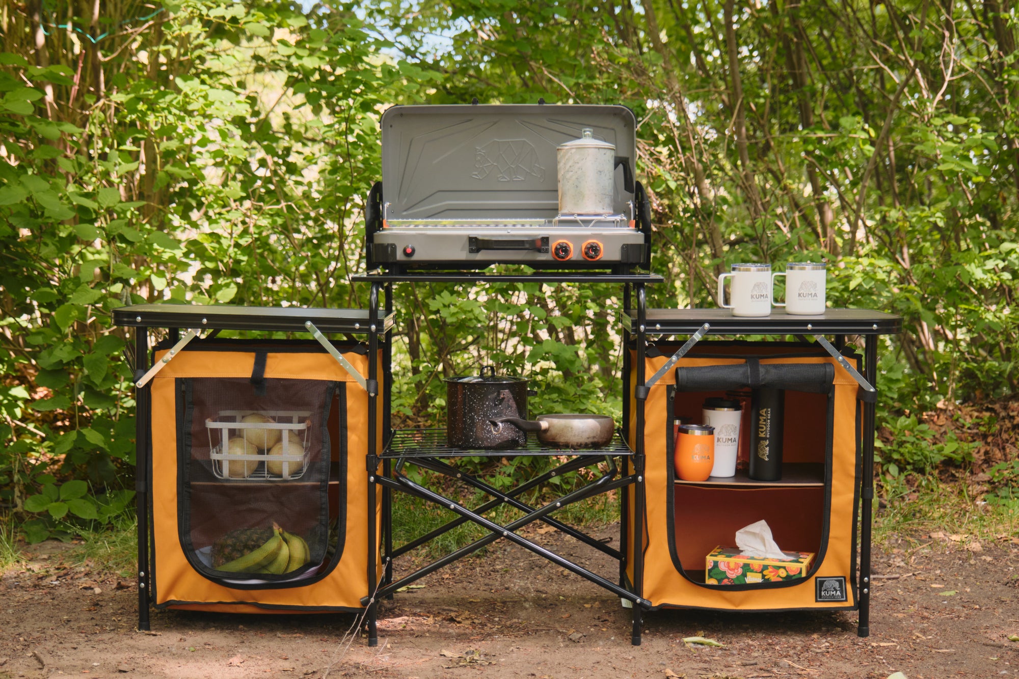 Durable aluminum camp kitchen with multiple tables and storage capacity
