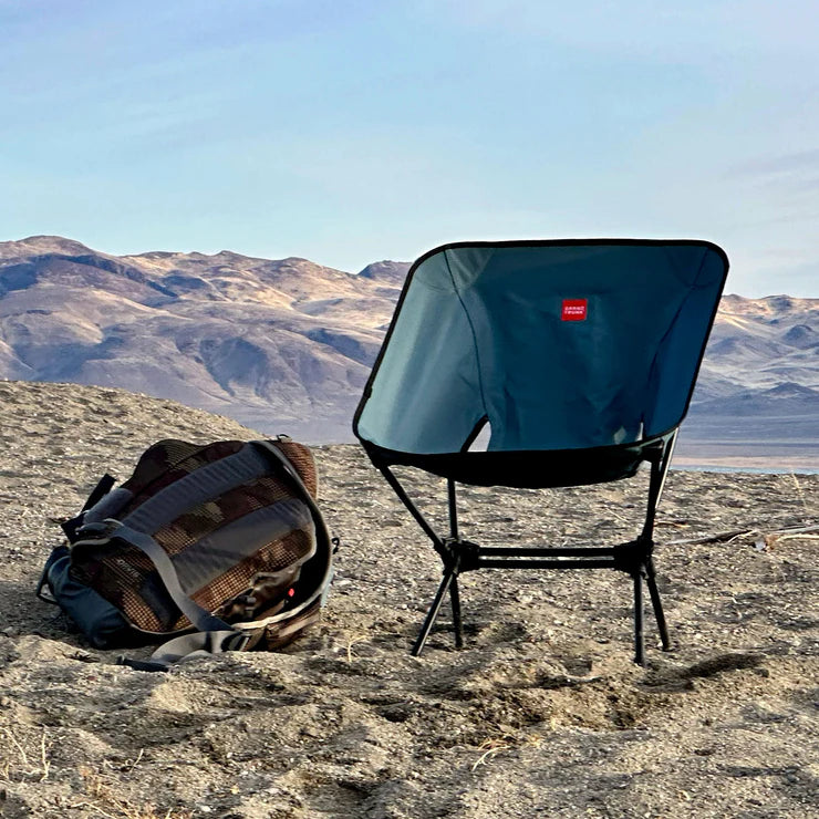 Grand Trunk Caddis HD portable chair used for camping and outdoor relaxation
