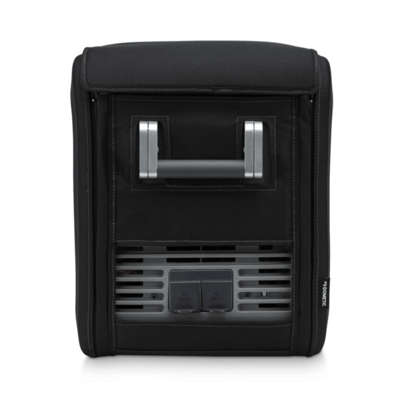 Protective cover on cooler at campsite, shielding from dust and rough terrain

