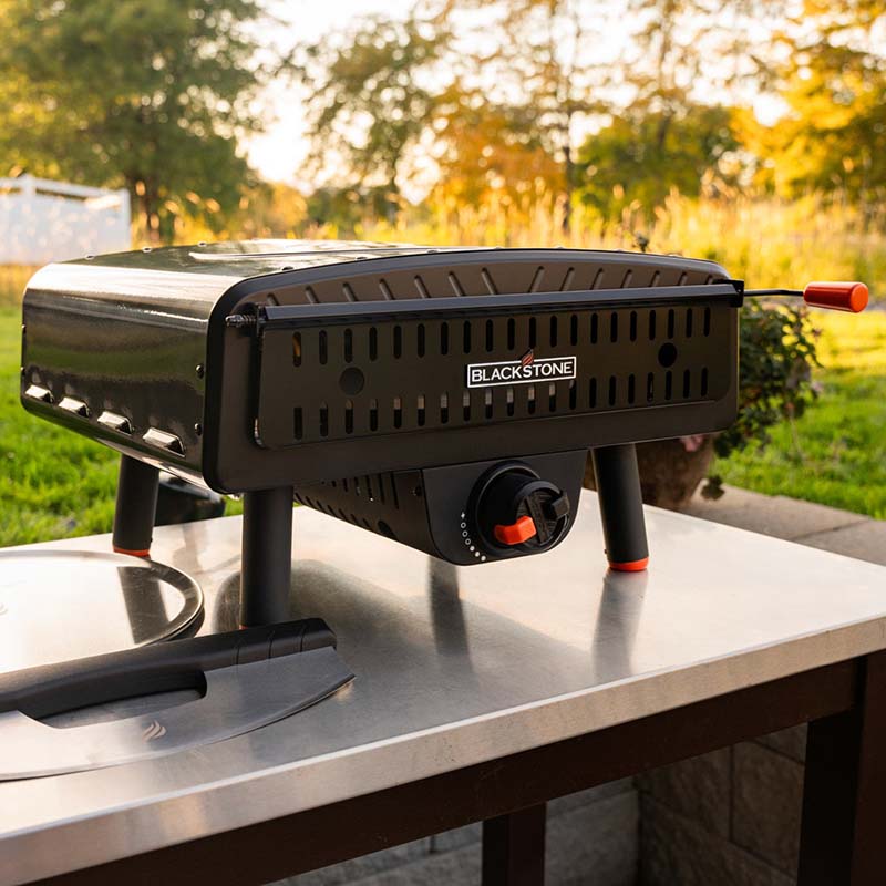 Lightweight and portable Blackstone pizza oven ready for transport