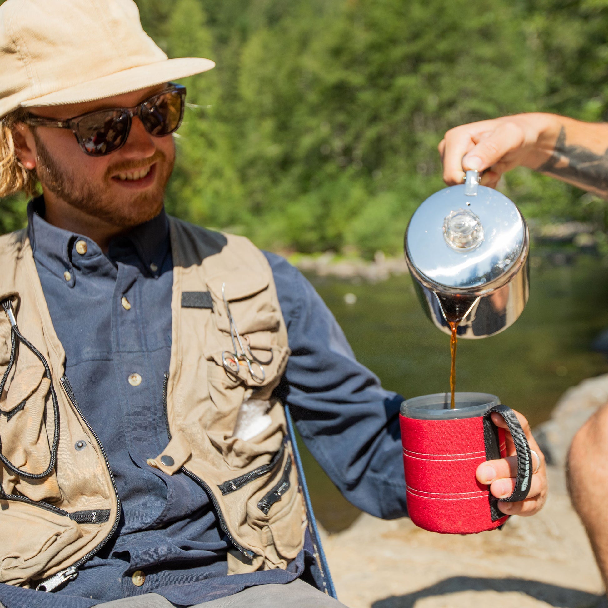 GSI Outdoors Glacier Stainless 9-cup coffee percolator for camping and outdoor cooking.