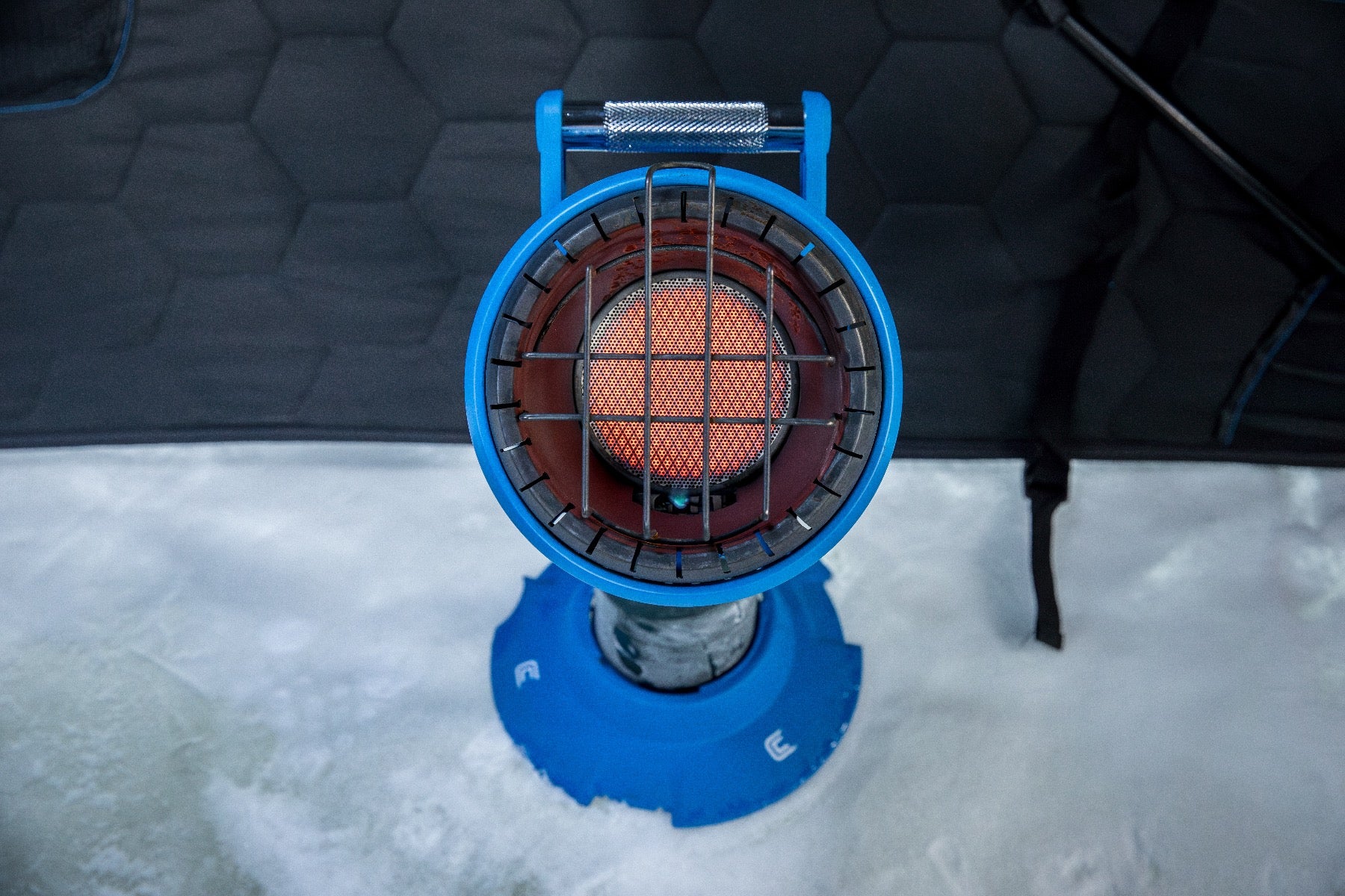 Clam CH-4200 Portable Propane Heater in use on ice, ideal for ice fishing.