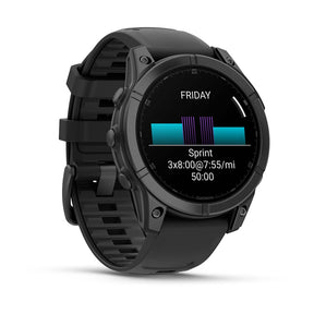 Garmin fēnix® E smartwatch displaying heart rate, sleep score, and stress levels on-screen, with a scenic outdoor background symbolizing health and wellness