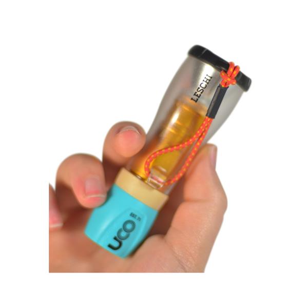 Leschi lantern flashlight combo hanging from tent pole or tree
