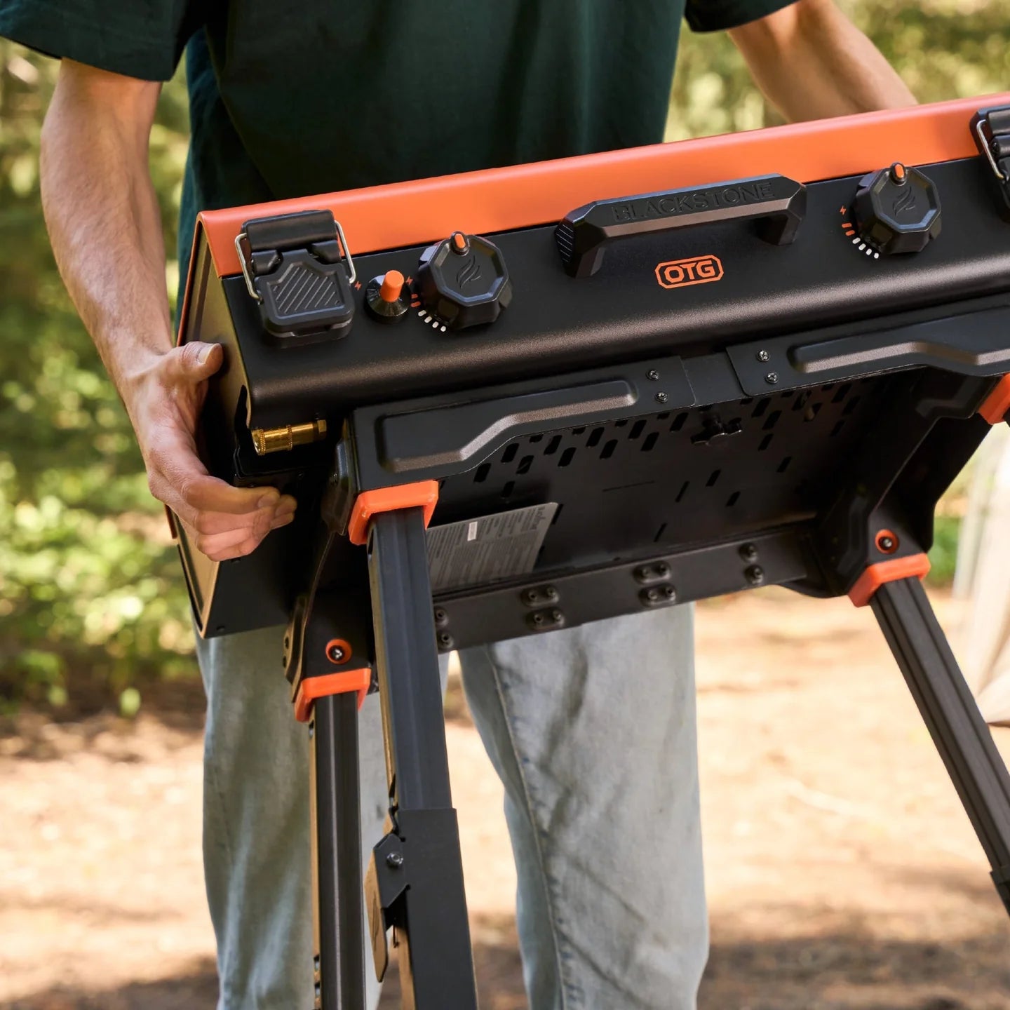 Blackstone portable griddle stand with height-adjustable legs for camping setups