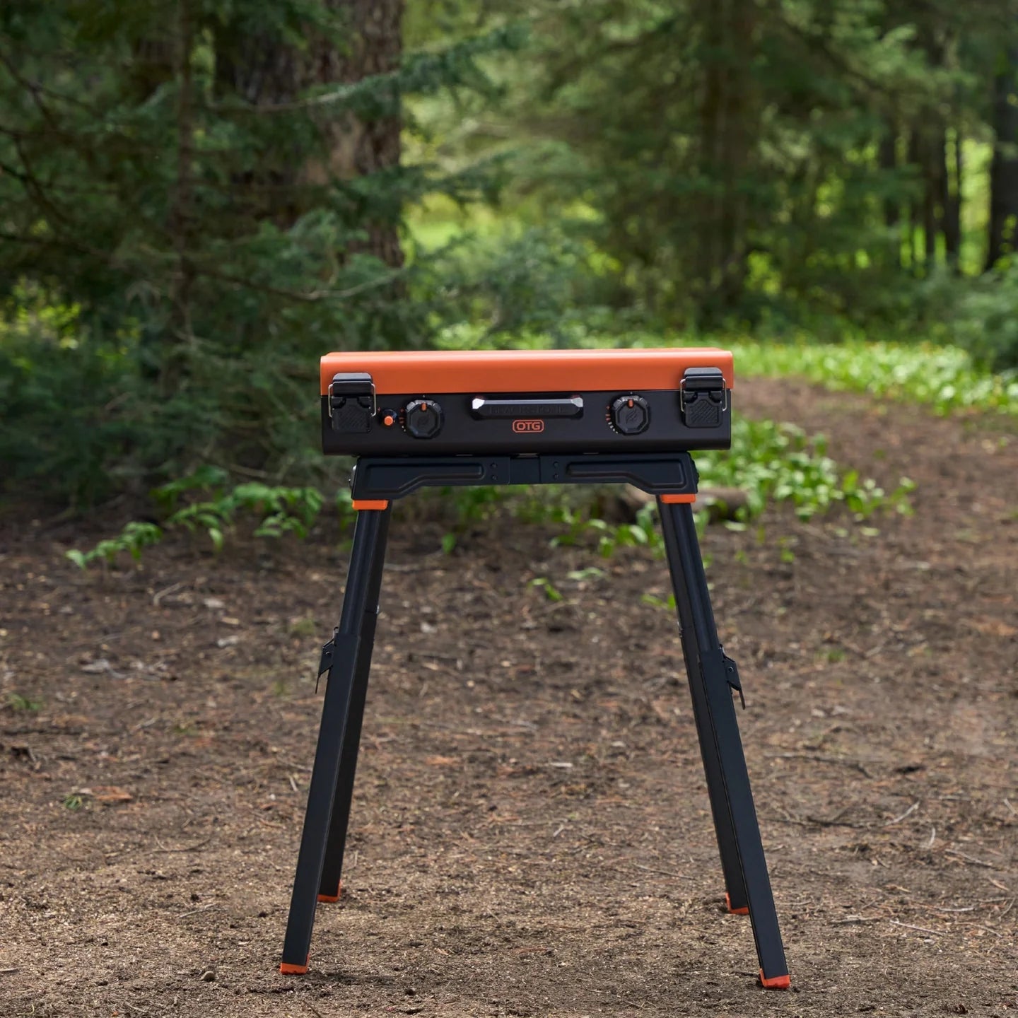 Portable Blackstone griddle leg stand with locking clips for stable outdoor cooking