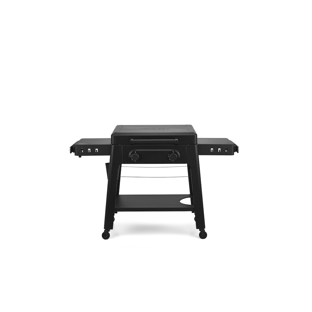 Family-style breakfast cooking on the Traeger Irontop 2-Burner flat top grill outdoors