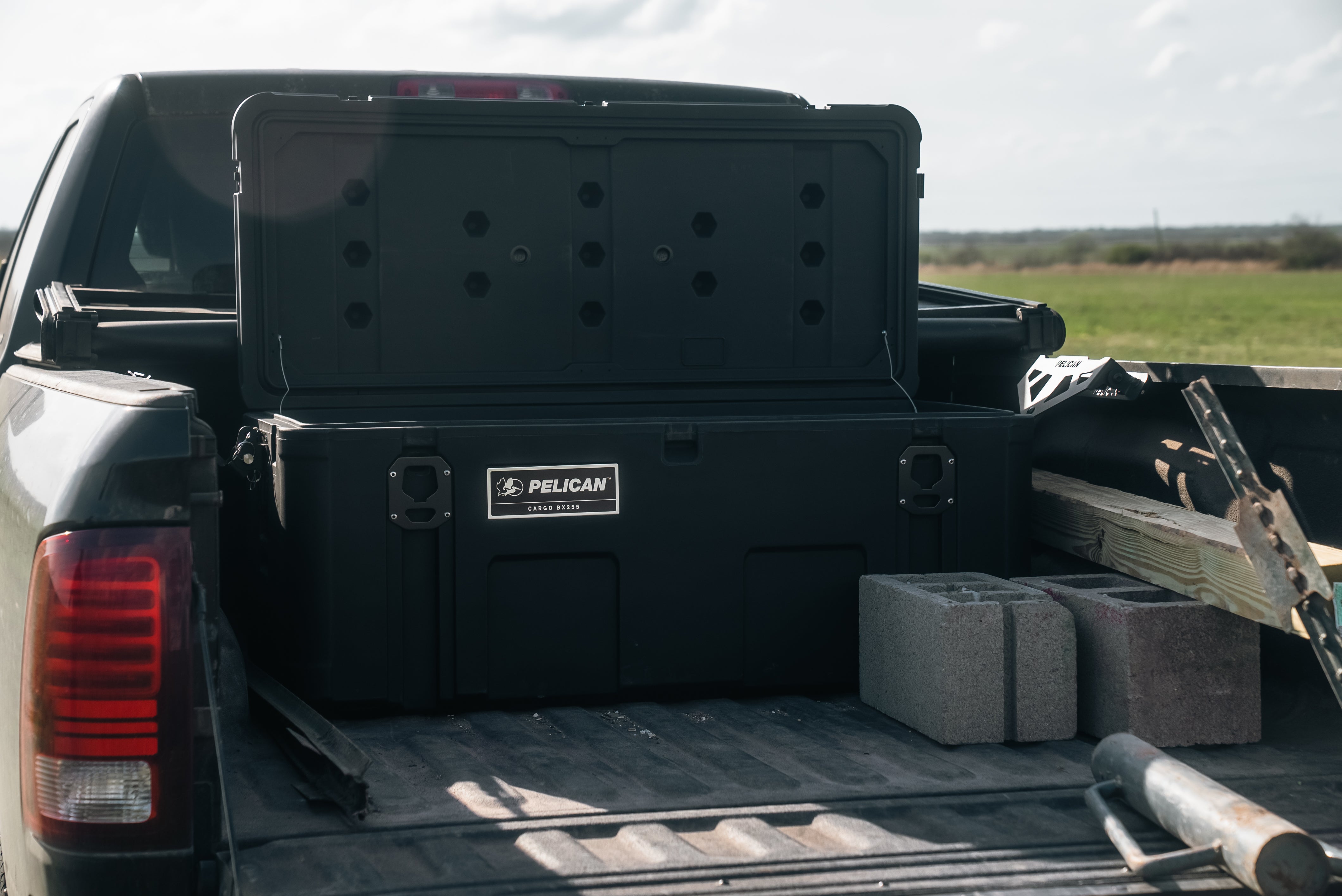 Pelican Cargo equipment case with tie-down plates and mounting interface

