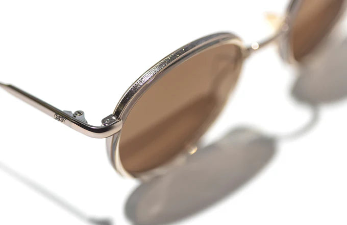 Baia small round frame sunglasses with 47mm lens width, 22mm bridge, and 134mm temple width, offering a medium eye coverage and stylish, effortless look.