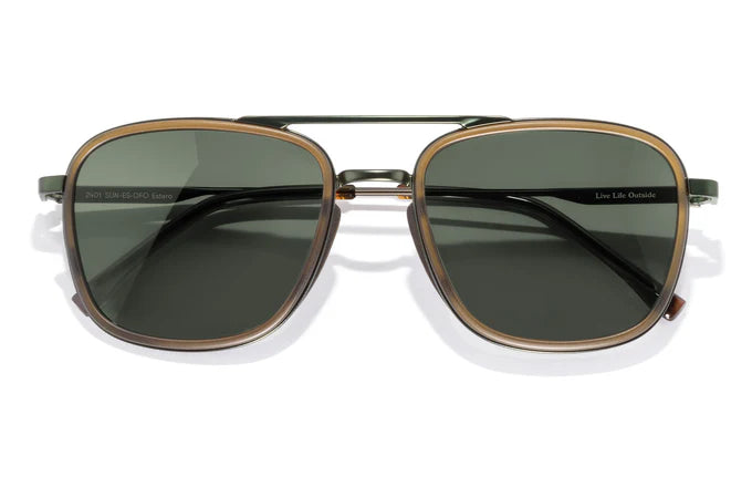 The Estero aviator-inspired sunglasses with a unique double brow line, crafted with premium CR-39 lenses and metal frames. The lenses offer 100% UVA/UVB protection and come in amber, green, and grey tints. Perfect for elevating outdoor style with comfort-focused sculpted nose pads and durable stainless steel hinges
