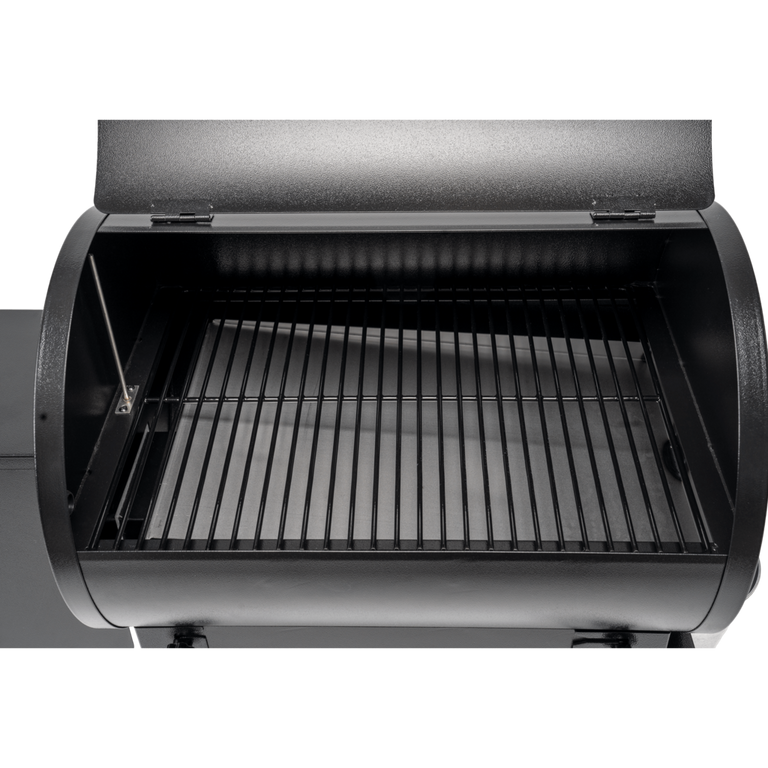 Burgers cooking on Traeger Tailgater pellet grill outdoor BBQ