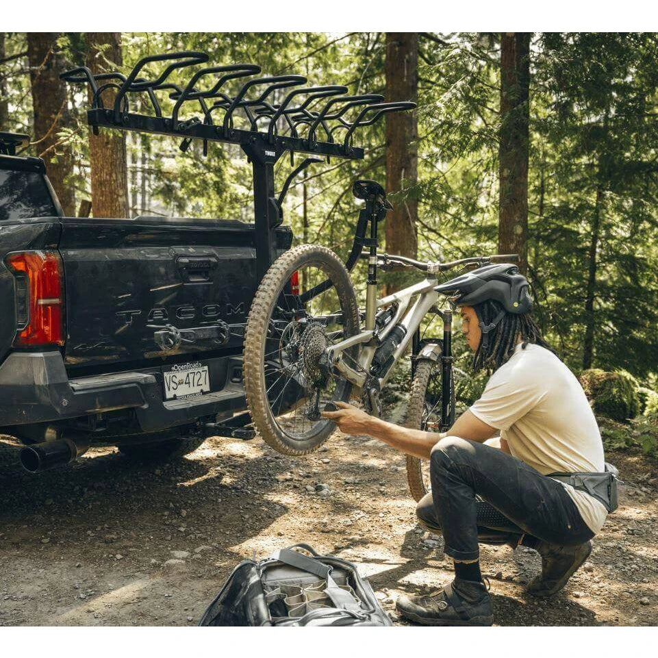 Trailside bike repair stand by Thule with secure mounting and foldable design

