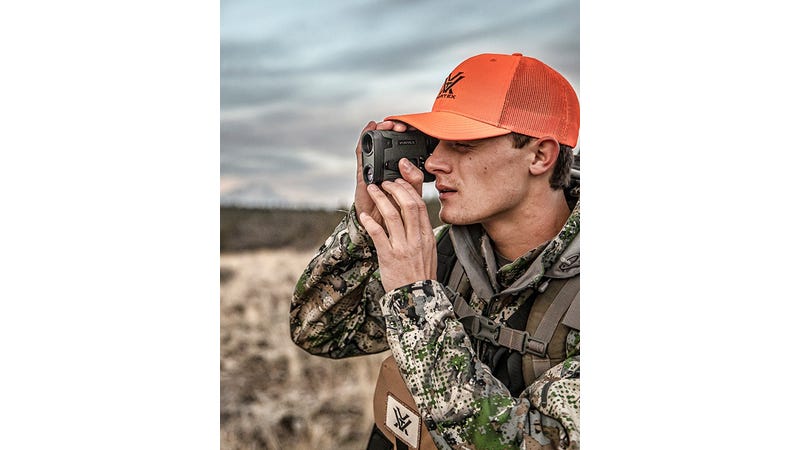 Laser rangefinder scan mode measuring distance across landscape