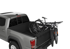 Thule 824PRO GateMate Pro holding up to 8 bikes securely in the truck bed.