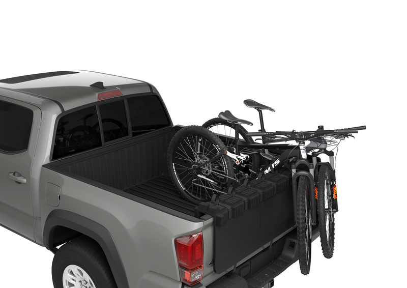 Thule 824PRO GateMate Pro holding up to 8 bikes securely in the truck bed.