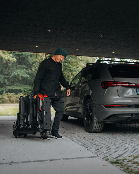 Thule Epos bike rack with bikes loaded, showing the generous spacing and secure fastening of large tires.