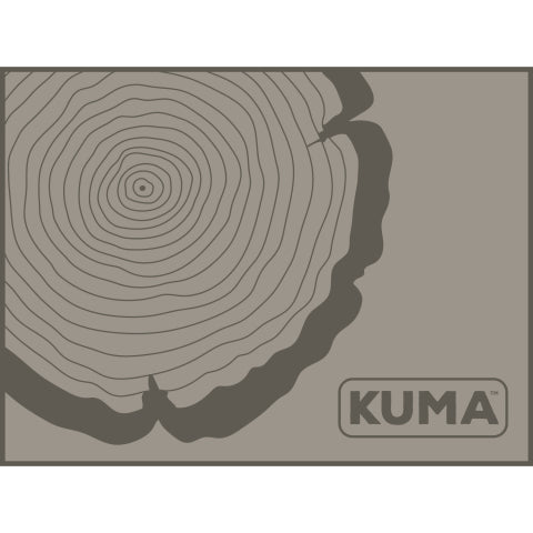 Wood chip RV mat with realistic forest floor pattern under RV awning