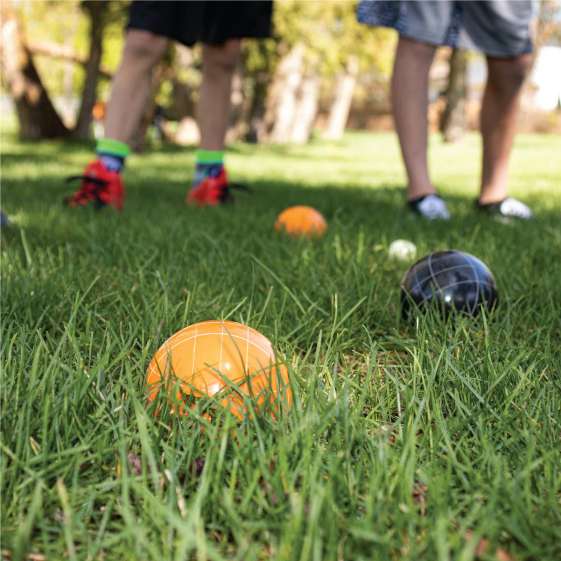 Kuma Classic Bocce Ball Set with white pallino ball and outdoor game accessories